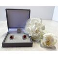 Sterling silver red garnet earrings in a box