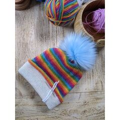 Vivid rainbow striped wool hat with blue pom-pom